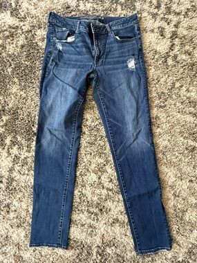 American Eagle Outfitters Dark Blue Skinny Jeans with Subtle Distressing